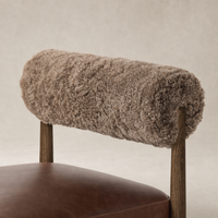 Taupe shearling Fern Bar + Counter Stool with a plush backrest and wooden legs.