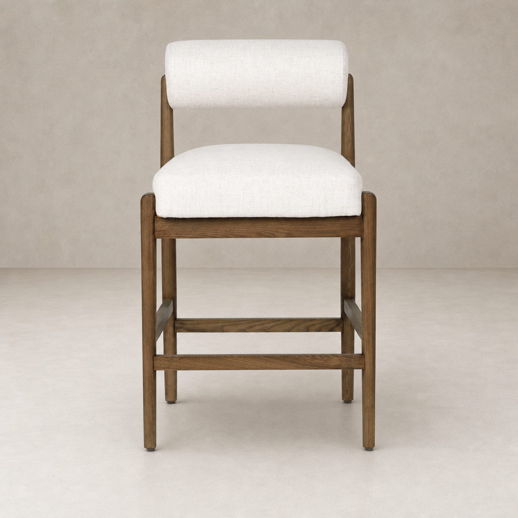 Fern Bar + Counter Stool in Dover Crescent features a sleek wood frame and plush upholstery.