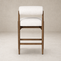 Fern Bar + Counter Stool in Dover Crescent features a sleek, upholstered design and sturdy wooden frame.