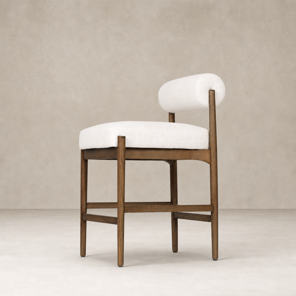 Fern Bar + Counter Stool in Dover Crescent featuring a sleek wooden frame and curved backrest.