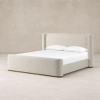 Contemporary bed in Crypton Nomad Snow featuring rounded edges and a plush finish.