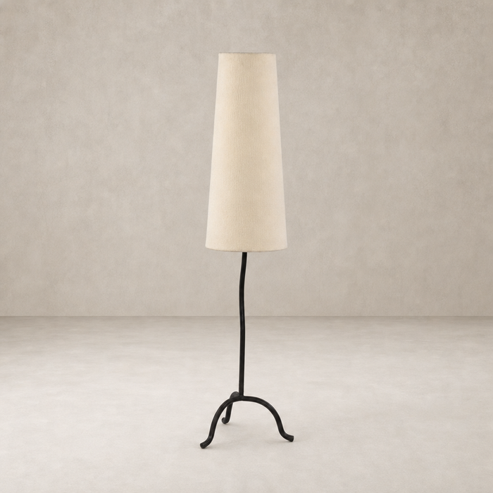 Stylish black wrought iron floor lamp with a tapered fabric shade.