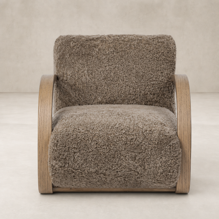 Taupe shearling Roan Chair with a sleek wooden frame and plush, textured upholstery.