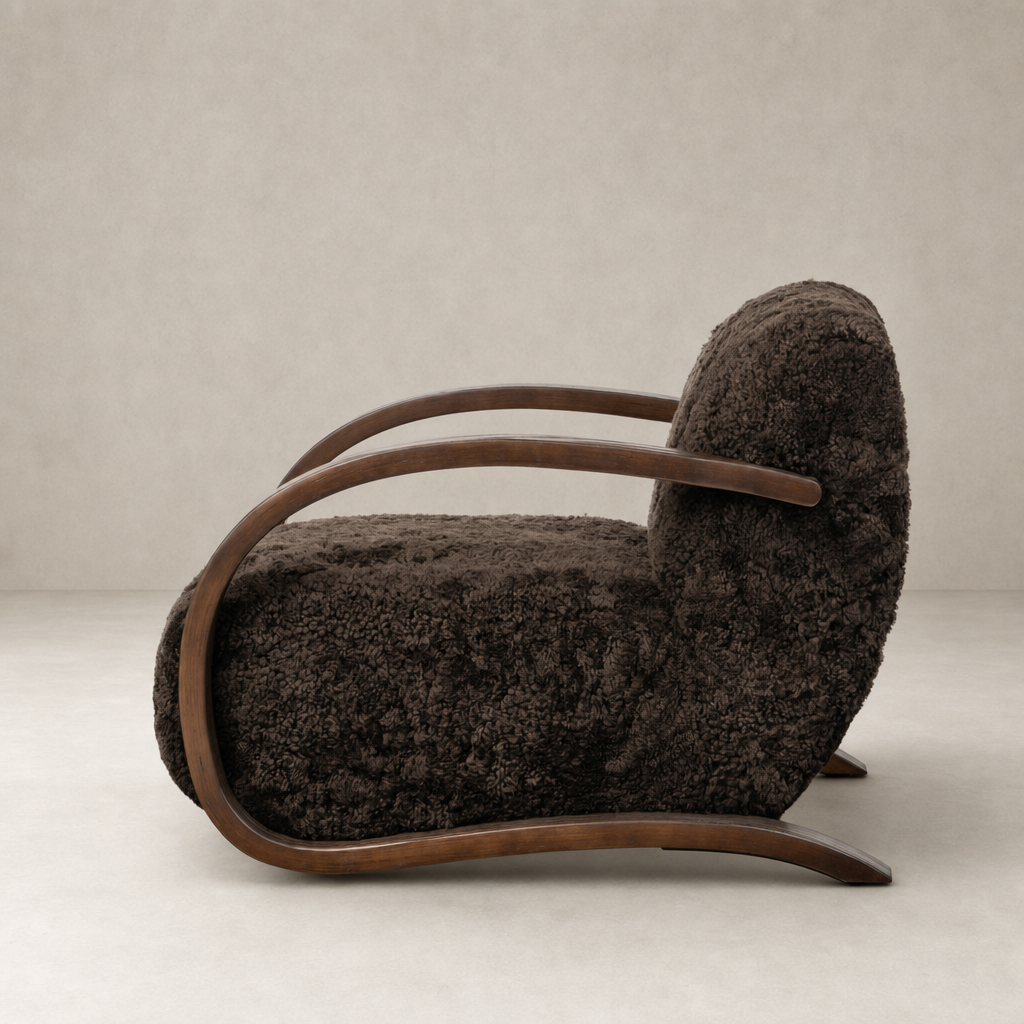 Cocoa shearling Roan Chair featuring smooth wooden armrests and plush upholstery.