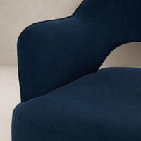 Amira Swivel Chair in Henry Navy with plush, soft fabric and curved, modern design.
