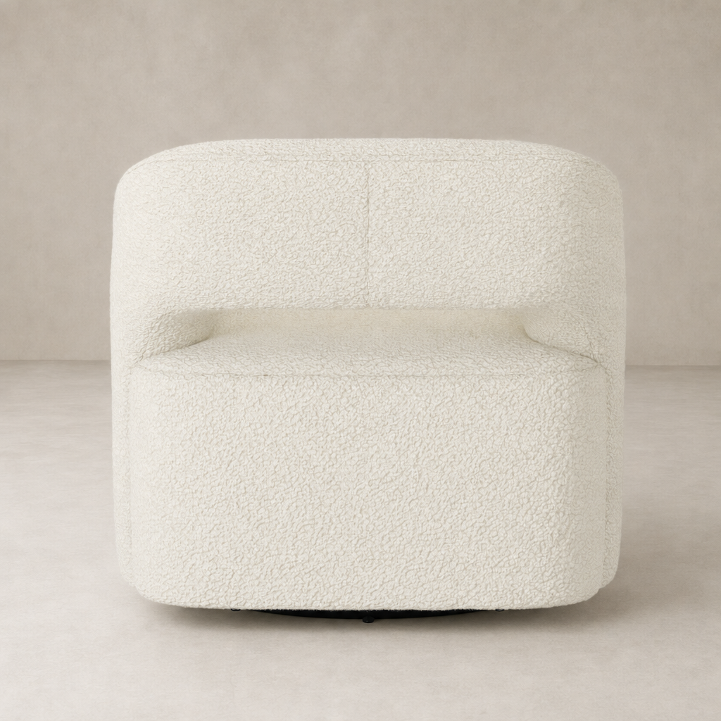 Amira Swivel Chair in natural sheepskin with plush textured upholstery and sleek design.