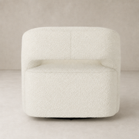 Amira Swivel Chair in natural sheepskin with plush textured upholstery and sleek design.