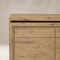 Cedar Rotating Desk in aged smoked oak resawn showcases a sleek, modern design with a textured surface.