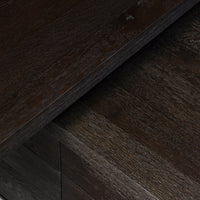 Close-up of Cedar Rotating Desk in Smoked Black Resawn Oak, showcasing textured wood grain finish.