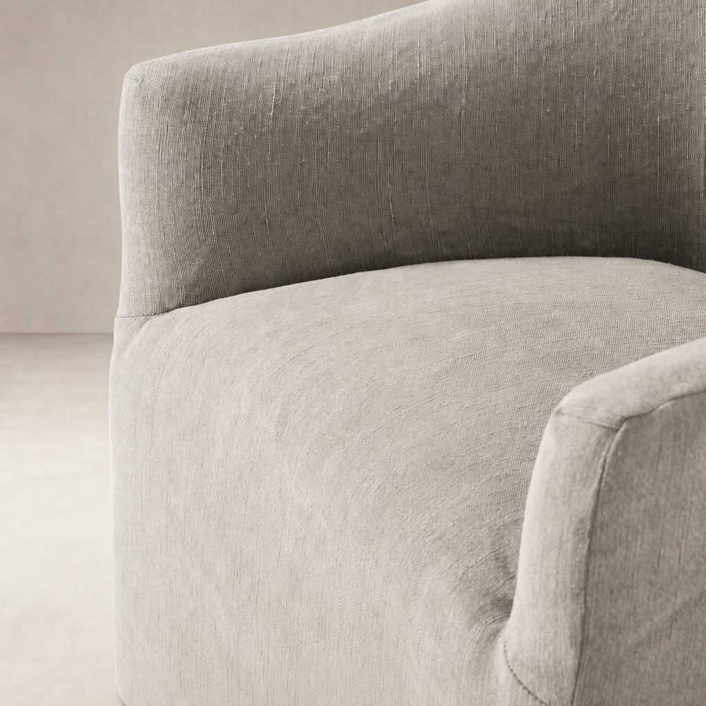 Close-up of the Harbor Dining Chair with Casters in Heather Twill Stone fabric, showcasing soft texture.