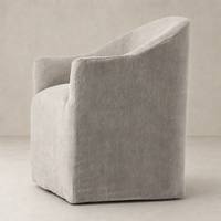 Harbor Dining Chair with Casters in Heather Twill Stone showcasing soft texture and curved design.