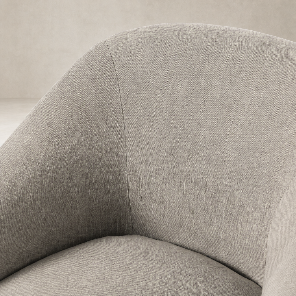 Close-up of the Harbor Dining Chair with Casters in Heather Twill Stone fabric, showcasing soft texture.