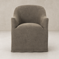 Harbor Dining Chair with Casters in Broadway Coffee featuring rounded back and smooth texture.