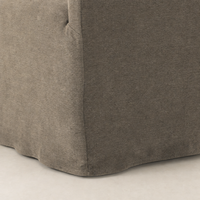 Close-up of the Harbor Dining Chair With Casters in Broadway Coffee fabric, showcasing its textured finish.
