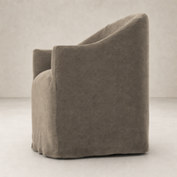 Harbor Dining Chair with Casters in Broadway Coffee, featuring a soft, rounded design.