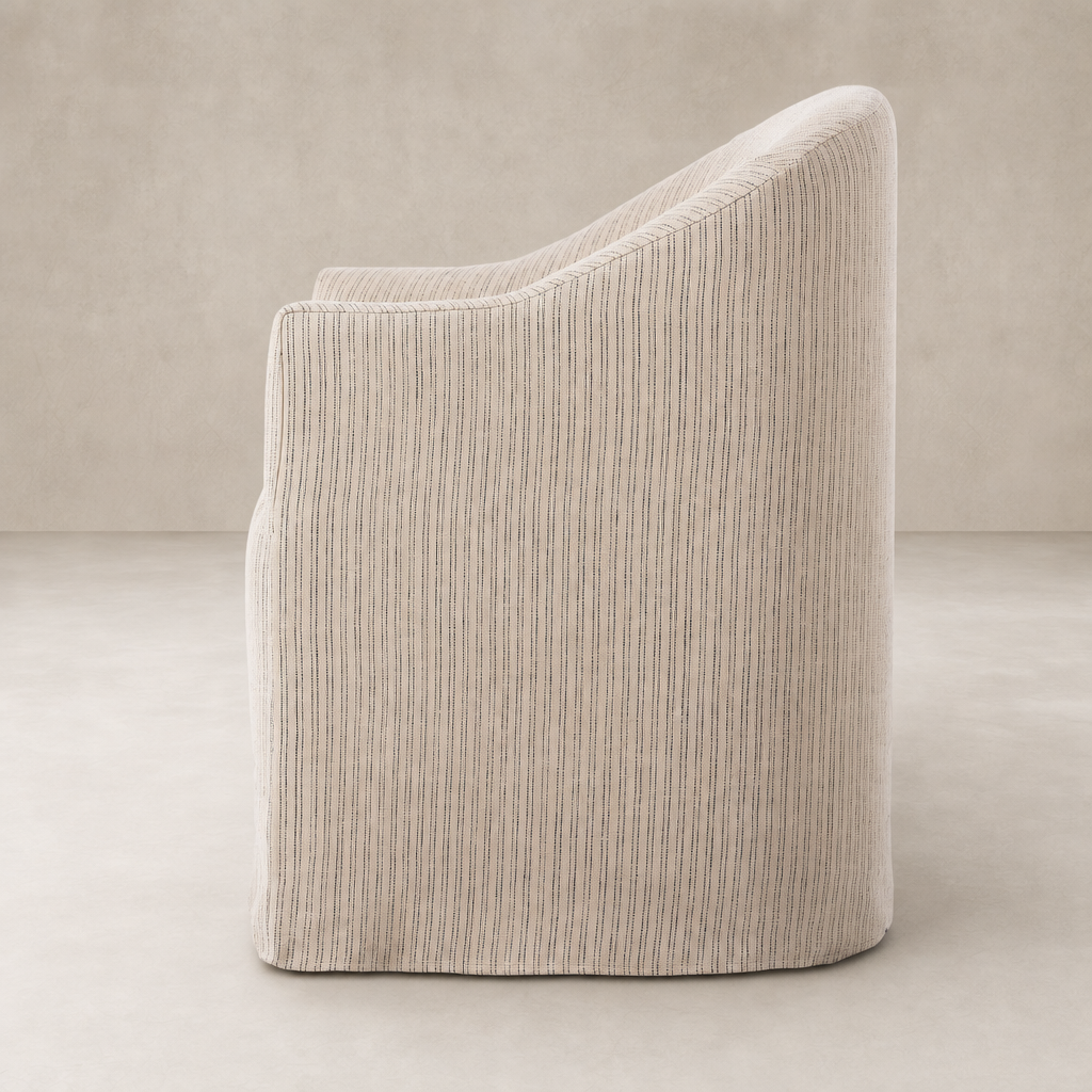 Harbor Dining Chair With Casters in Laine Navy featuring a sleek, curved design.