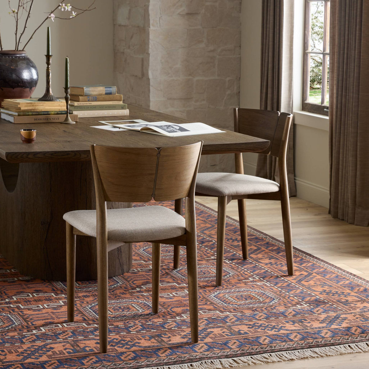 Hayes Dining Chair in Alcala Taupe with sleek wooden legs and comfortable fabric seat.