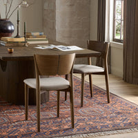 Hayes Dining Chair in Alcala Taupe with sleek wooden legs and comfortable fabric seat.