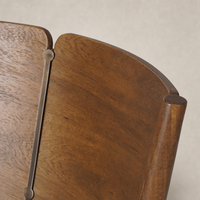 Close-up of the curved backrest of the Hayes Dining Chair in Alcala Taupe wood.