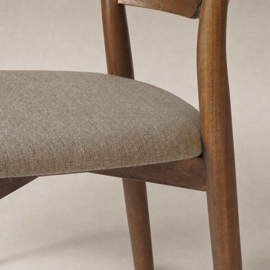 Hayes Dining Chair in Alcala Taupe with a textured fabric seat and wooden frame.
