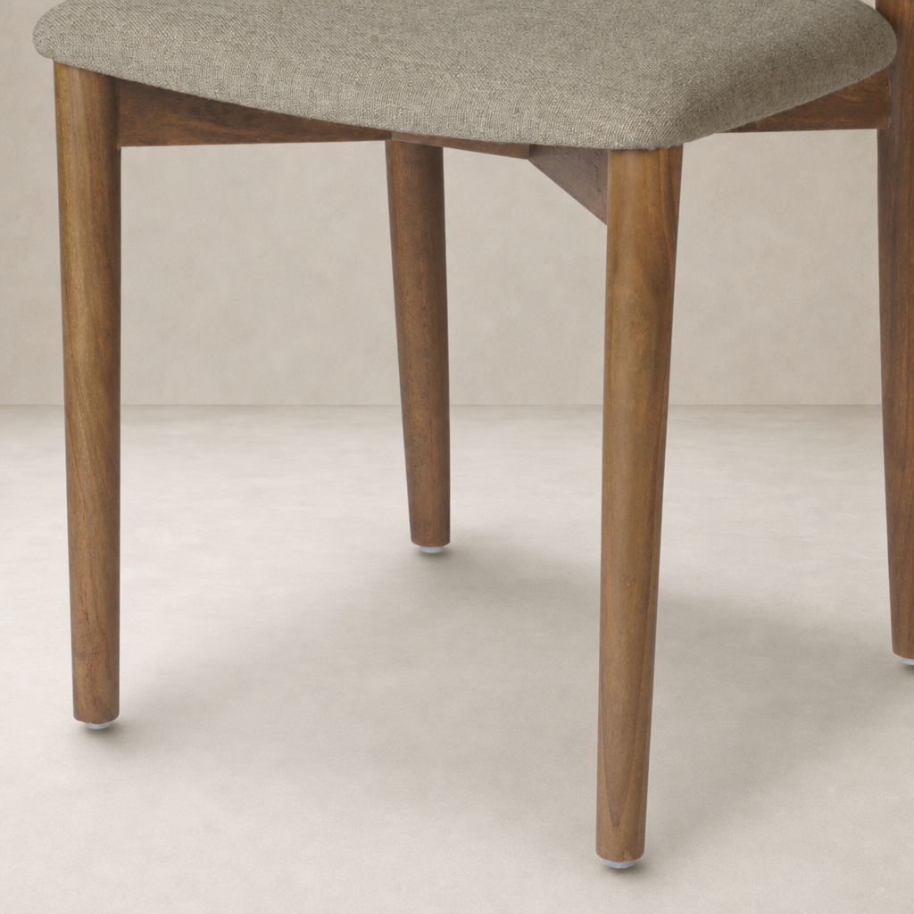 Hayes Dining Chair in Alcala Taupe with sleek wooden legs and comfortable fabric seat.