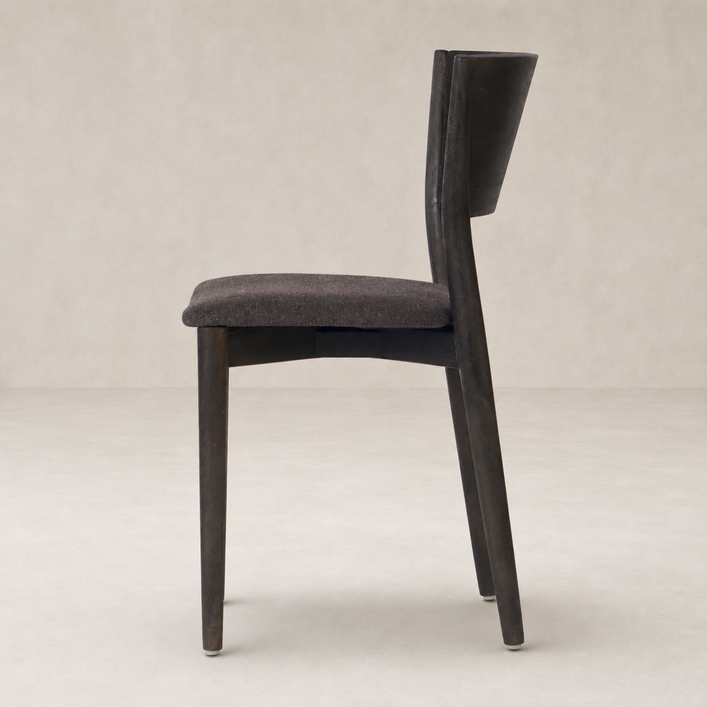 Side view of Hayes Dining Chair in Antwerp Noir with a sleek design and upholstered seat.