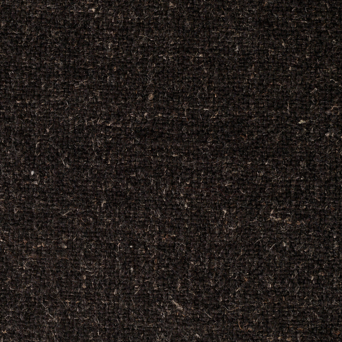 Textured close-up of Hayes Dining Chair fabric in Antwerp Noir, showcasing its rich, dark weave.