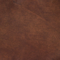 Close-up of the Marcella Accent Chair in rich brown leather, highlighting its luxurious texture.