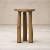 Rustic Drift Nesting End Table features a round top and three sturdy, textured wooden legs.