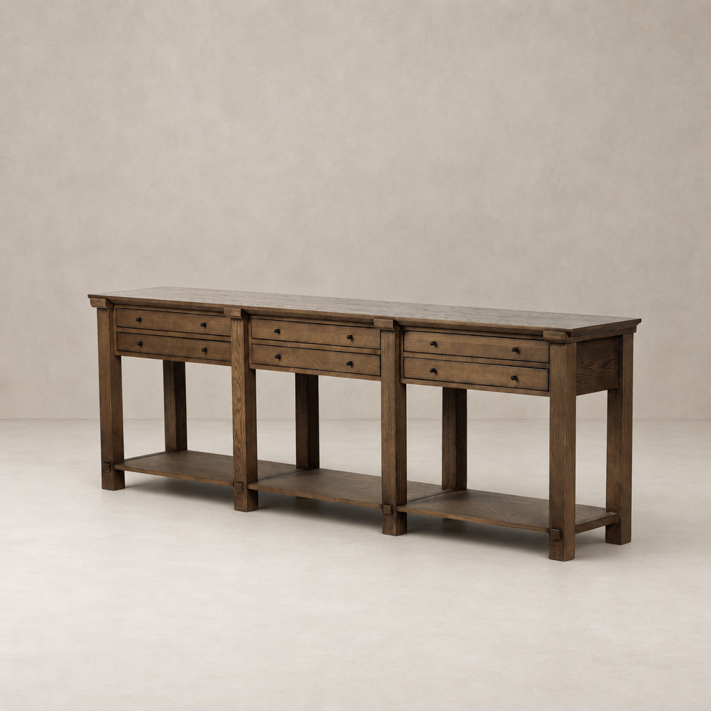 Tan oak Willowdale console table featuring three drawers and a lower shelf.