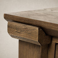 Close-up of the Willowdale Console Table in tan oak showcasing its textured wood finish.