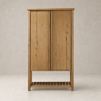 Tokyo Cabinet in aged natural oak featuring two doors and a slatted base.