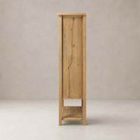 Tokyo Cabinet in aged natural oak showcasing a minimalist design and open shelf.