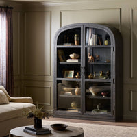Wide cabinet in dark anthracite oak showcasing decorative items and books.