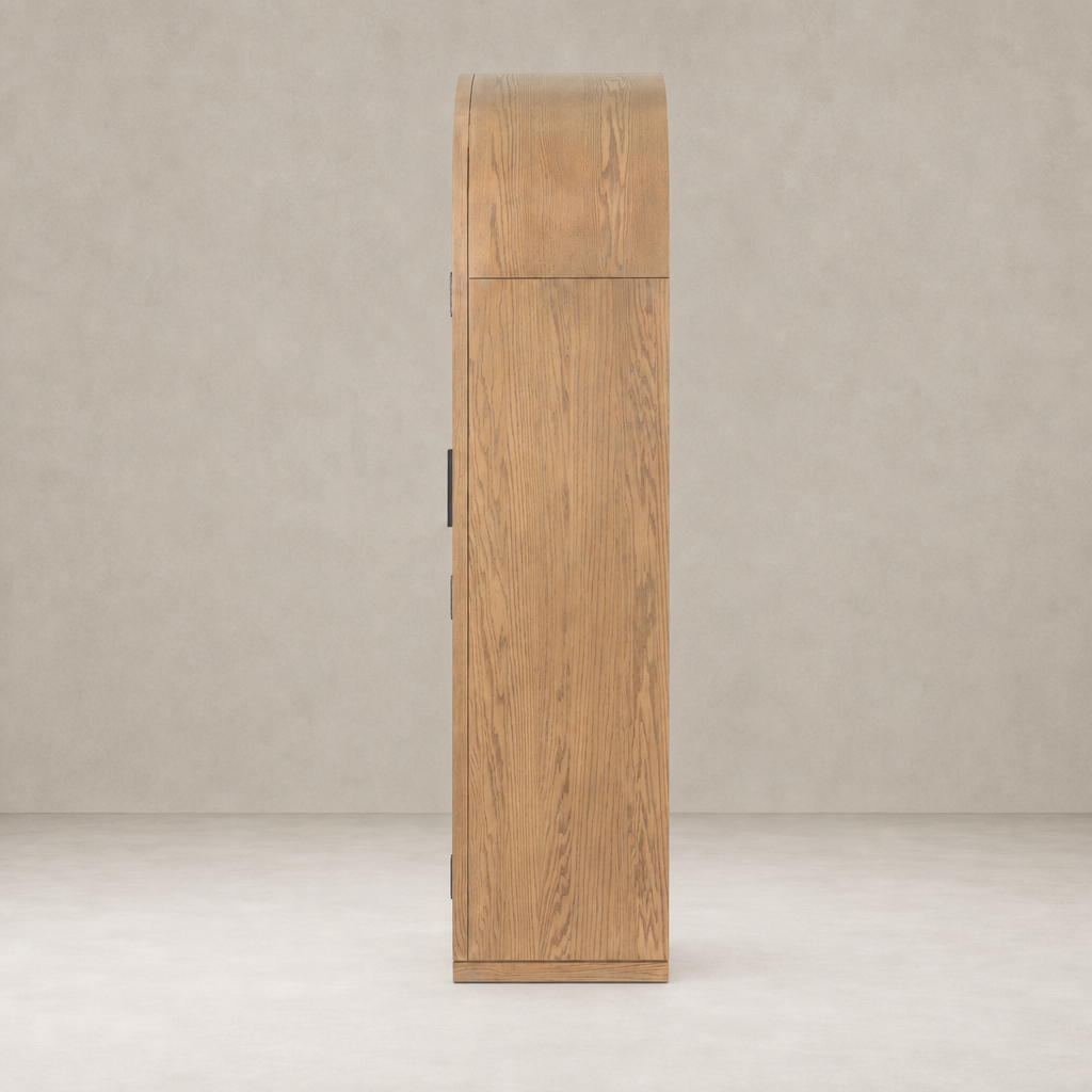 Wide cabinet in drifted smoked oak featuring a smooth, rounded top and stylish design.