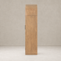 Wide cabinet in drifted smoked oak featuring a smooth, rounded top and stylish design.