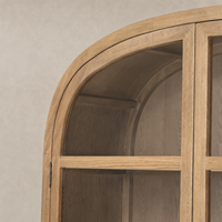 Drifted Smoked Oak wide cabinet featuring curved edges and spacious display shelves.