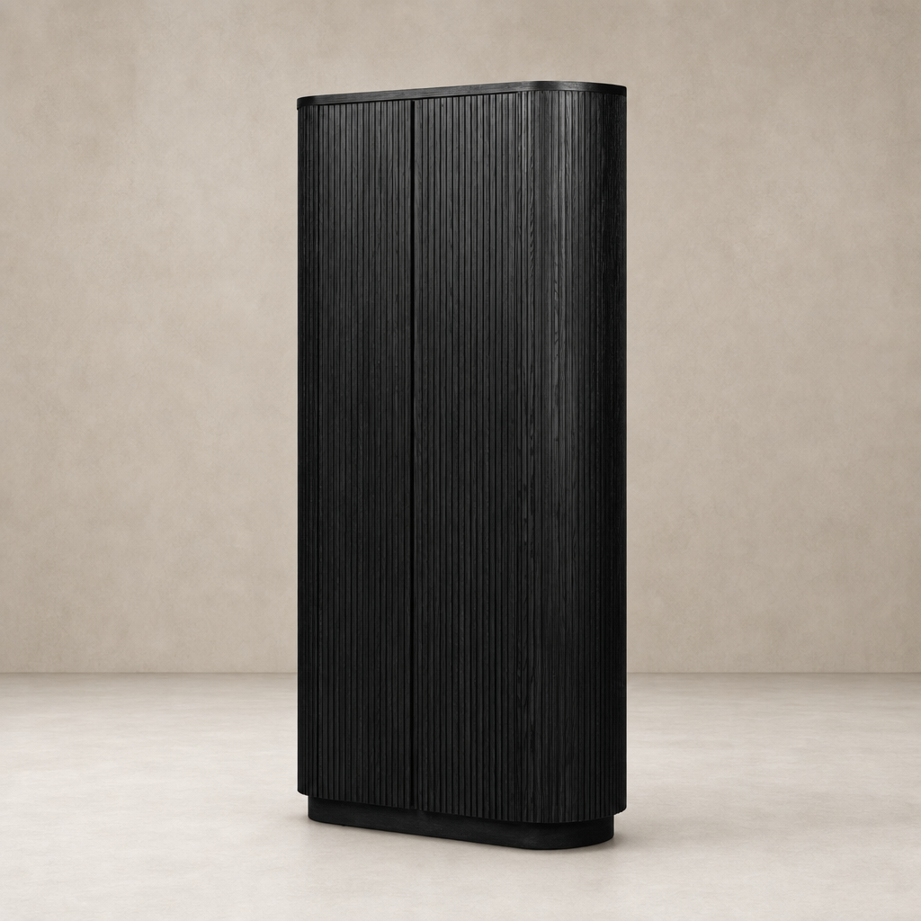 Beatrix Cabinet in cerused black oak with vertical grooves and rounded corners.
