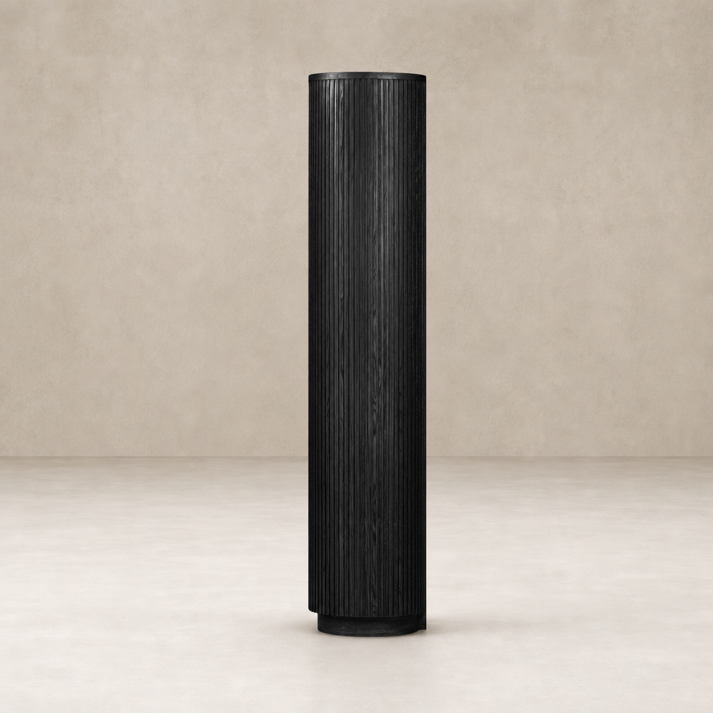 Beatrix Cabinet in cerused black oak with vertical ribbed texture and cylindrical shape.
