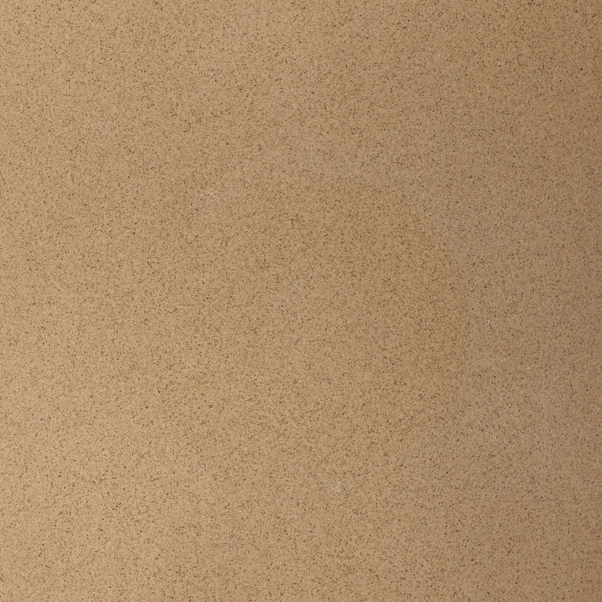 Tan speckled ceramic table lamp with a smooth, textured finish.