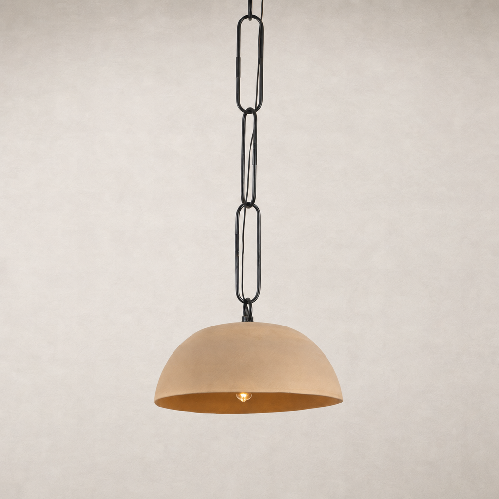 Tan speckled ceramic pendant light with a sleek black chain for modern decor.