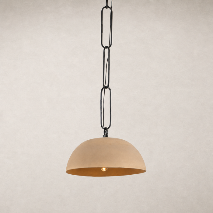 Tan speckled ceramic pendant light with a sleek black chain for modern decor.