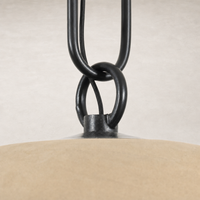 Tan speckled ceramic pendant light with black metal chain detail.