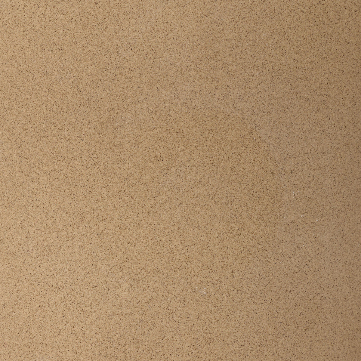 Tan speckled ceramic floor lamp showcasing a smooth, textured surface.