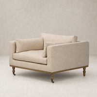 Savannah Chair in Alcala Wheat with plush cushions and a wooden base.