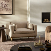 Savannah Chair in Alcala Wheat, featuring plush cushions and wooden legs in a cozy living room setting.