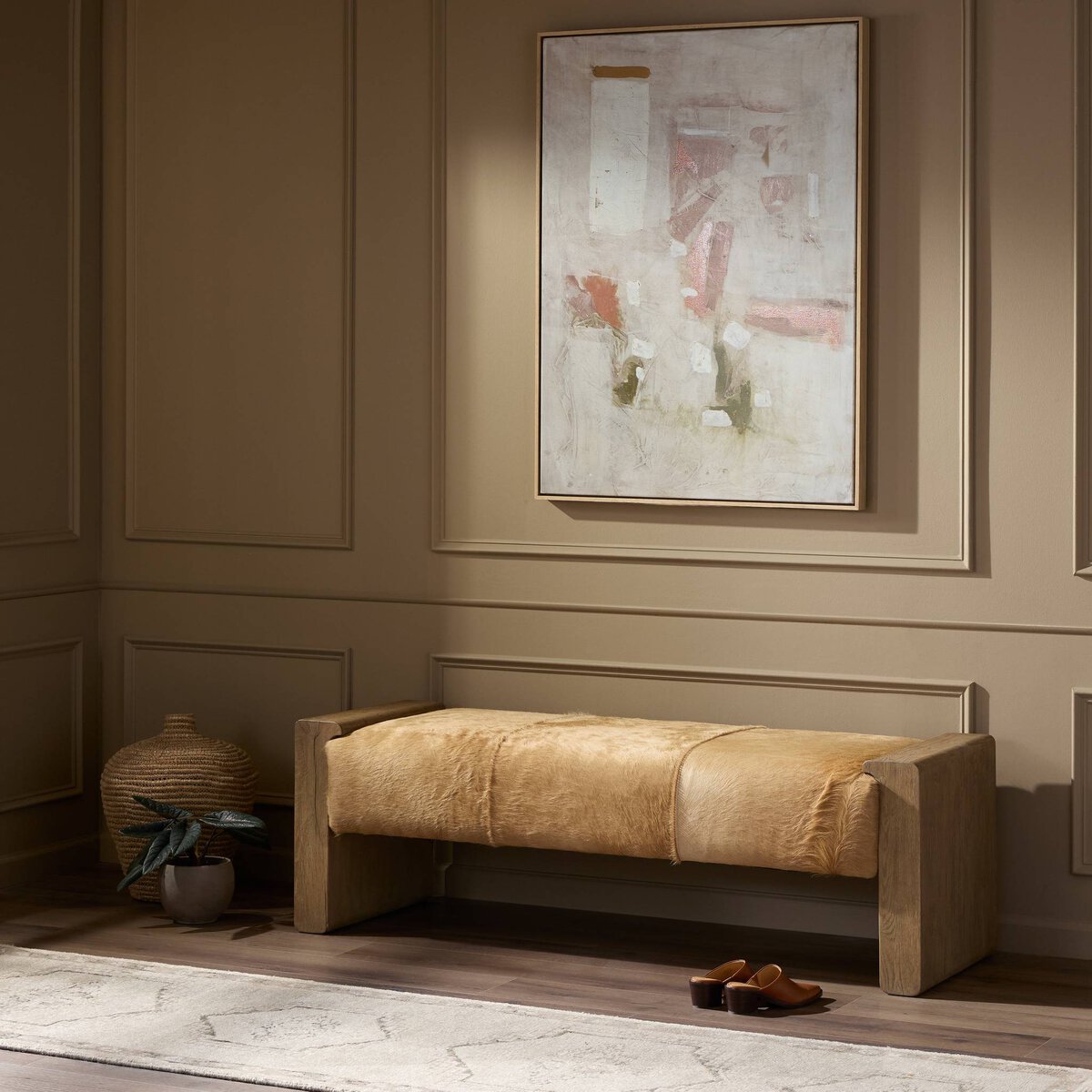 Rustic wood Vale Accent Bench with soft leather upholstery, styled against a neutral wall.