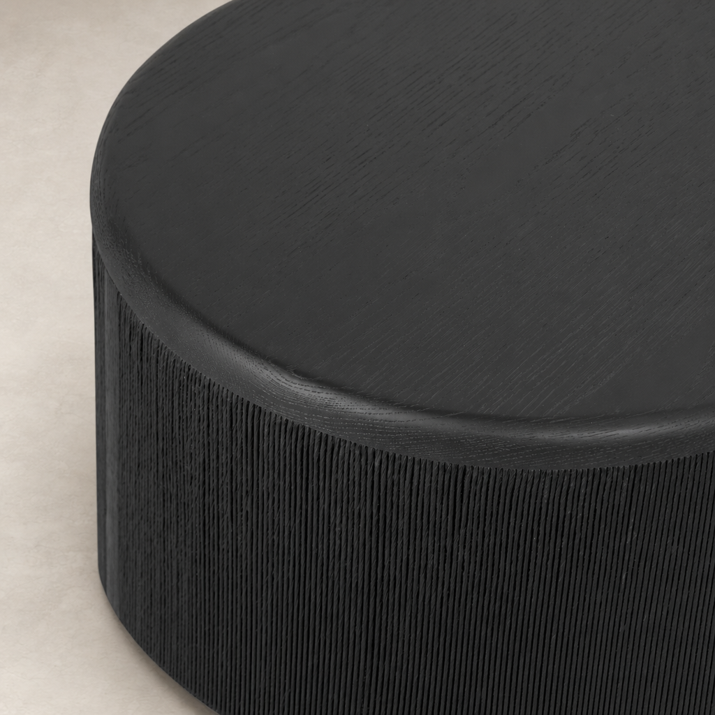 Roselle End Table in black with a textured cylindrical base and smooth top surface.