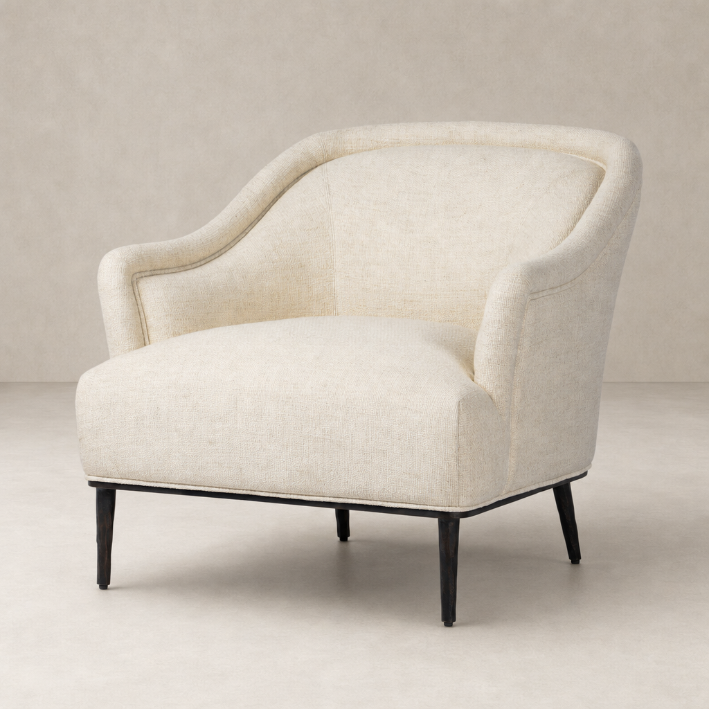 Wells Chair in Thames Cream features a curved back and sleek legs.