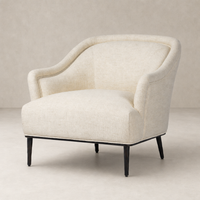 Wells Chair in Thames Cream features a curved back and sleek legs.